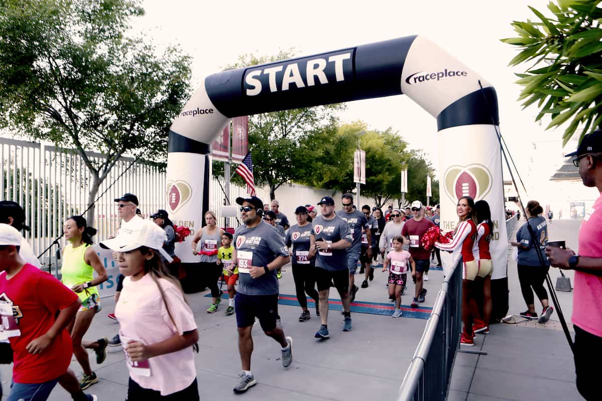 Participants set off from the starting line at the 2022 Golden Heart Run.